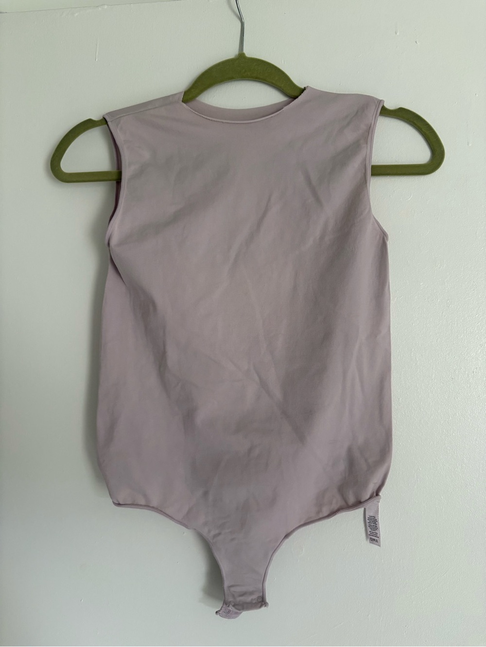 SKIMS Sleeveless Bodysuit in Light Mauve